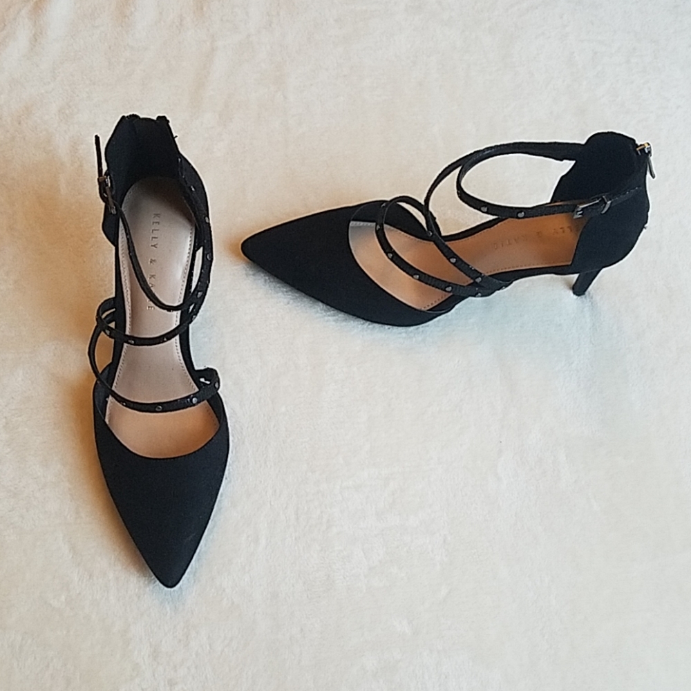 Black, strappy, closed-toe stilettos